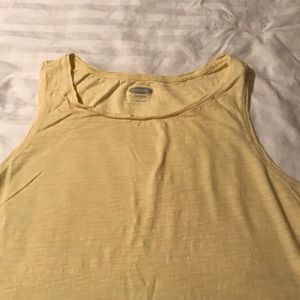 4 sleeveless tops.  Size large.